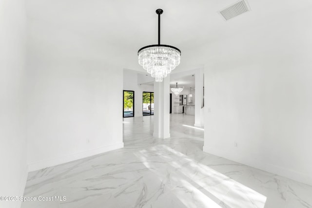 2355 N Riverside Dr, Indialantic, FL 32903 - unfurnished dining area featuring visible vents, marble finish floor, baseboards, and a chandelier