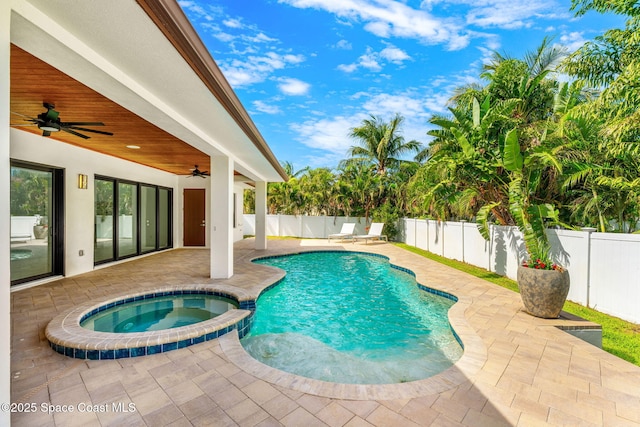 2355 N Riverside Dr, Indialantic, FL 32903 - view of pool featuring a fenced backyard, a ceiling fan, a patio, and a pool with connected hot tub