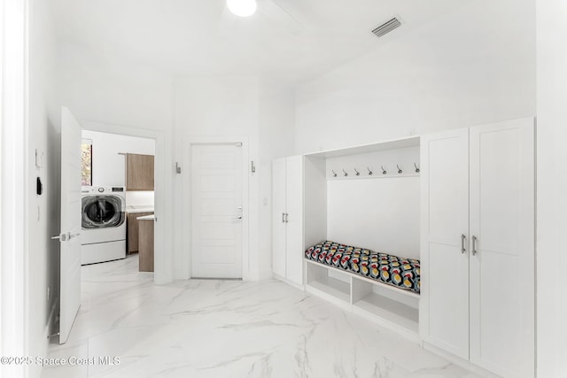 2355 N Riverside Dr, Indialantic, FL 32903 - mudroom featuring visible vents, baseboards, washer / dryer, and marble finish floor