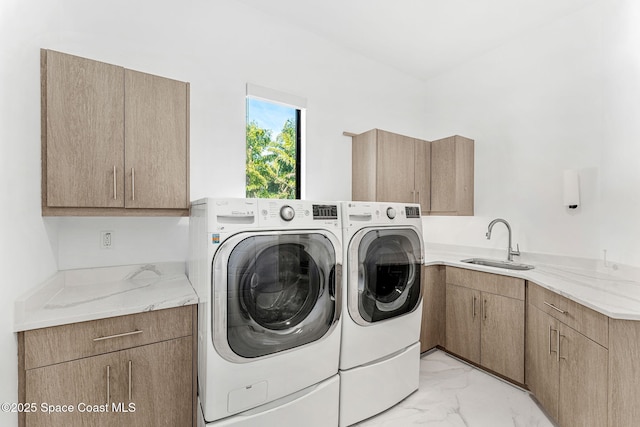 2355 N Riverside Dr, Indialantic, FL 32903 - laundry room featuring a sink, marble finish floor, cabinet space, and washing machine and clothes dryer