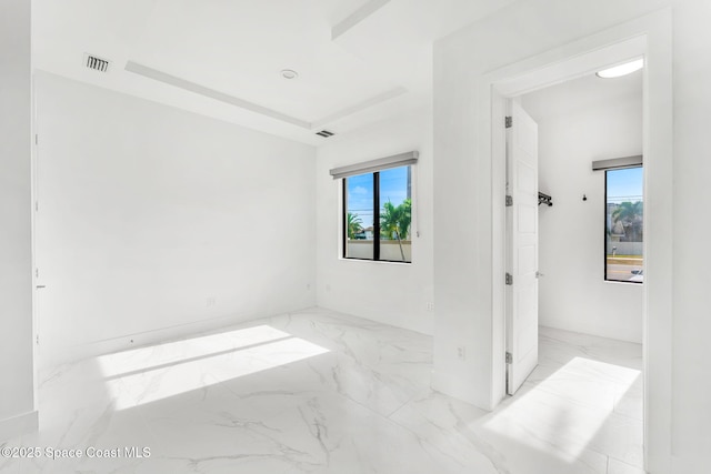 2355 N Riverside Dr, Indialantic, FL 32903 - unfurnished bedroom featuring baseboards, visible vents, and marble finish floor