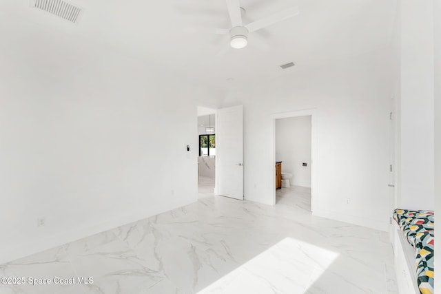 2355 N Riverside Dr, Indialantic, FL 32903 - unfurnished room featuring visible vents, marble finish floor, baseboards, and ceiling fan