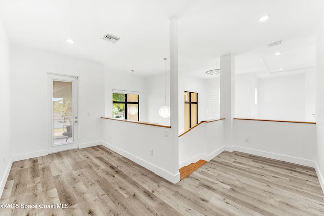 2355 N Riverside Dr, Indialantic, FL 32903 - spare room with baseboards, recessed lighting, wood finished floors, and visible vents