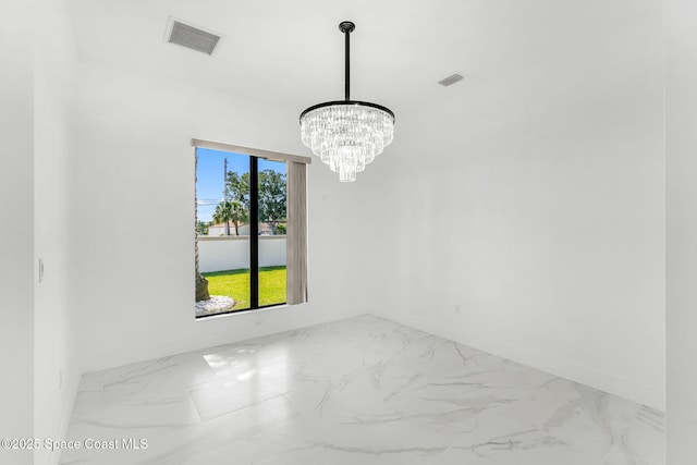 2355 N Riverside Dr, Indialantic, FL 32903 - unfurnished room featuring a chandelier, baseboards, visible vents, and marble finish floor