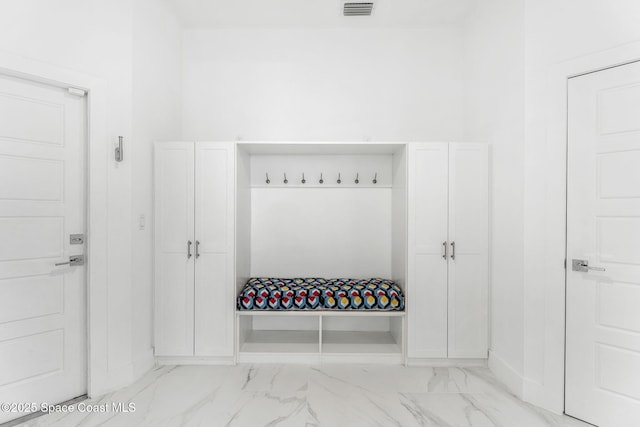 2355 N Riverside Dr, Indialantic, FL 32903 - mudroom featuring visible vents, marble finish floor, and baseboards