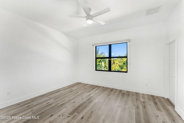 2355 N Riverside Dr, Indialantic, FL 32903 - empty room with light wood-type flooring, baseboards, and ceiling fan