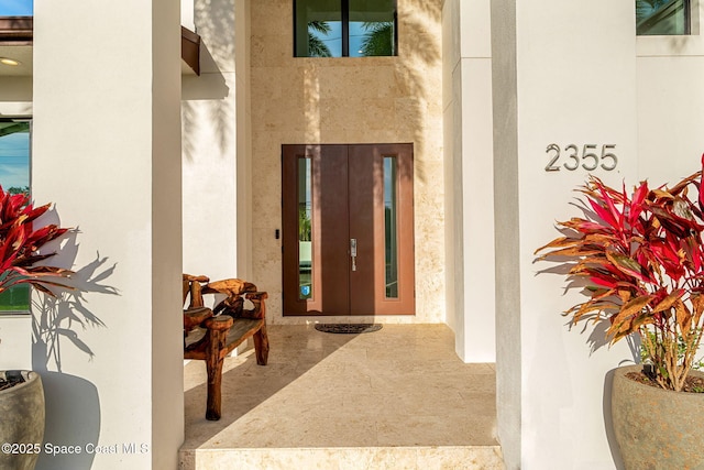 2355 N Riverside Dr, Indialantic, FL 32903 - view of exterior entry with stucco siding