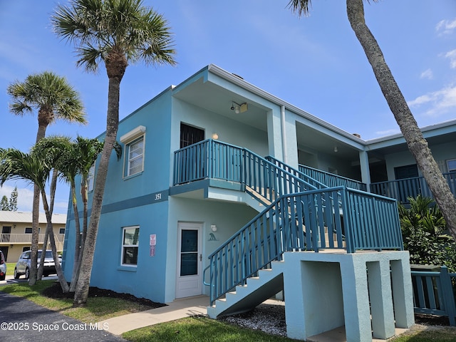 351 Taylor Ave Unit E2, Cape Canaveral, FL 32920 - view of building exterior with stairway