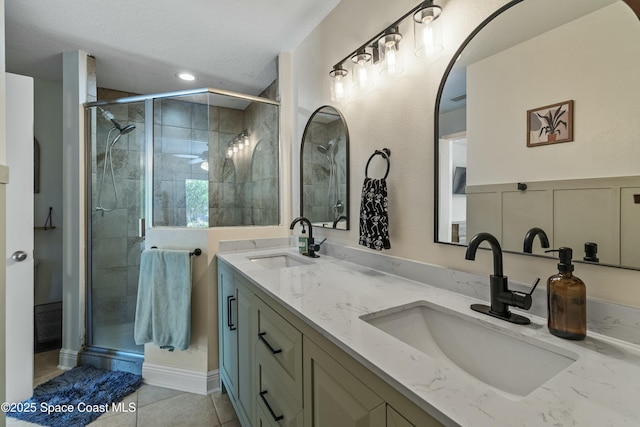 1044 Bernice Rd, Rockledge, FL 32955 - bathroom with a sink, tile patterned flooring, and a stall shower