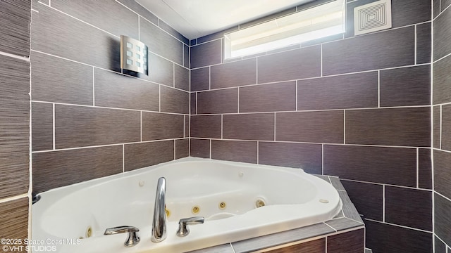 bathroom featuring a jetted tub