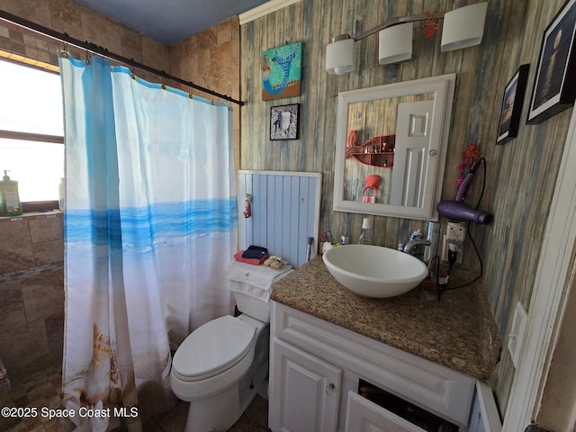 305 Harrison Ave, Cape Canaveral, FL 32920 - bathroom featuring vanity, a shower with shower curtain, and toilet