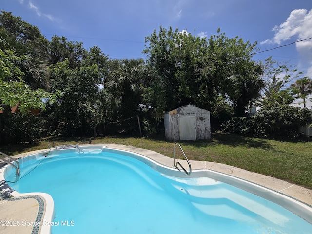 305 Harrison Ave, Cape Canaveral, FL 32920 - swimming pool featuring a yard