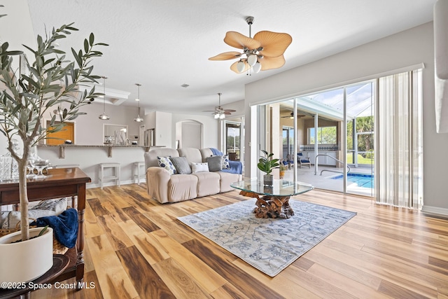 4800 Solitary Dr, Rockledge, FL 32955 - living room with wood finished floors, ceiling fan, and a sunroom
