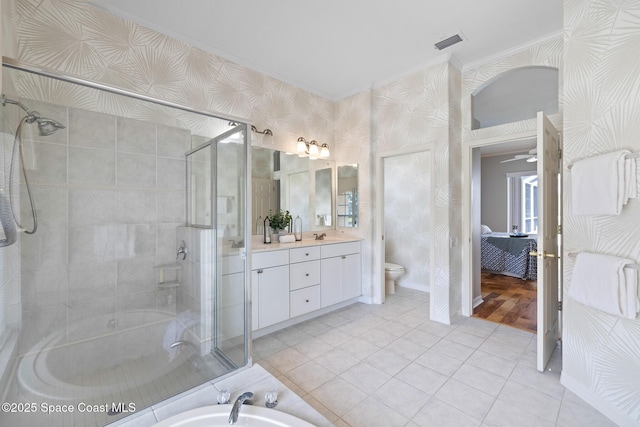 4800 Solitary Dr, Rockledge, FL 32955 - full bath with a shower stall, ornamental molding, toilet, visible vents, and a garden tub