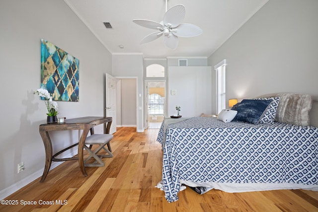 4800 Solitary Dr, Rockledge, FL 32955 - bedroom with ornamental molding, light wood finished floors, visible vents, and baseboards
