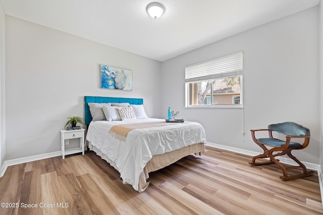 4800 Solitary Dr, Rockledge, FL 32955 - bedroom featuring light wood finished floors and baseboards