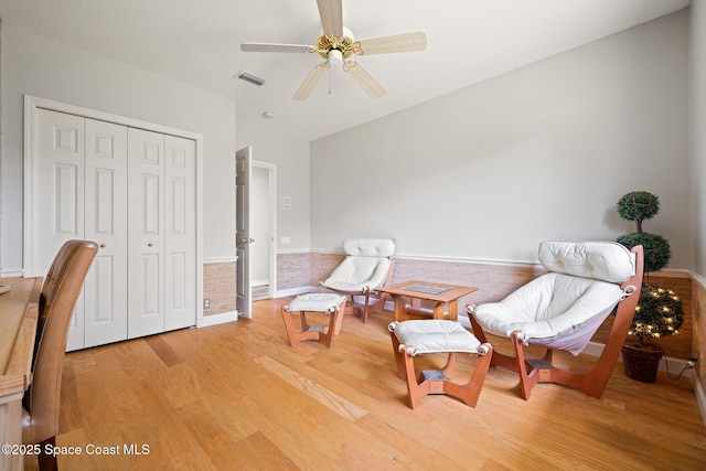 4800 Solitary Dr, Rockledge, FL 32955 - sitting room featuring baseboards, visible vents, ceiling fan, and light wood-style flooring