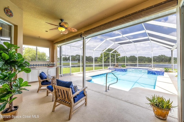 4800 Solitary Dr, Rockledge, FL 32955 - outdoor pool with a lanai, a ceiling fan, and a patio area