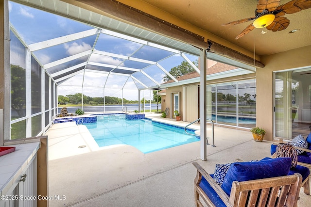 4800 Solitary Dr, Rockledge, FL 32955 - outdoor pool with a ceiling fan, a water view, a patio, and glass enclosure
