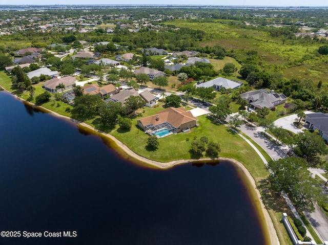 4800 Solitary Dr, Rockledge, FL 32955 - drone / aerial view featuring a residential view and a water view