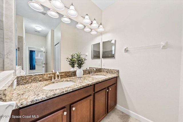 3624 Sansome Cir, Melbourne, FL 32940 - full bath featuring double vanity, baseboards, and tile patterned flooring