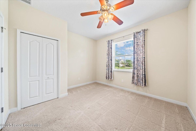 3624 Sansome Cir, Melbourne, FL 32940 - unfurnished bedroom with carpet floors, baseboards, and a closet