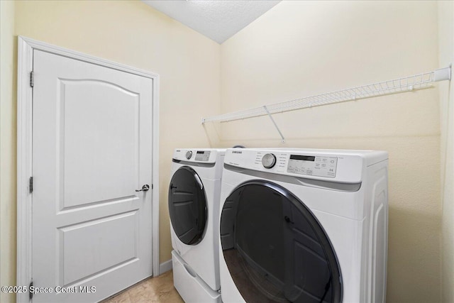3624 Sansome Cir, Melbourne, FL 32940 - clothes washing area with washer and dryer
