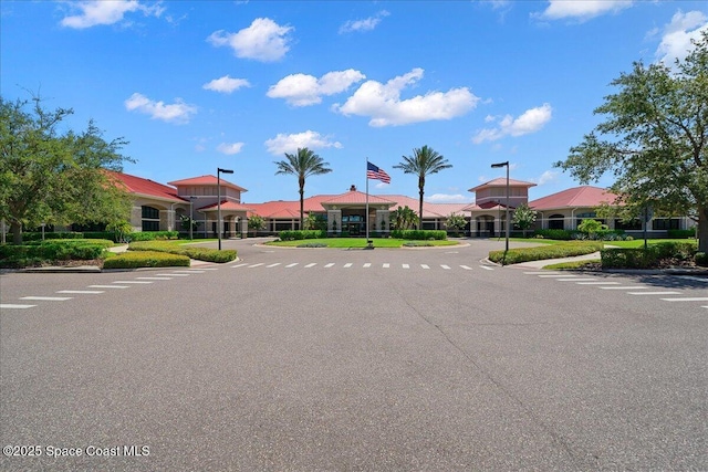 3624 Sansome Cir, Melbourne, FL 32940 - view of asphalt street with street lighting, curbs, and sidewalks