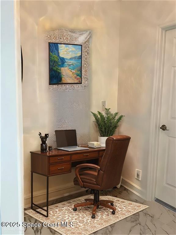 115 Briarcliff Cir, Sebastian, FL 32958 - office area with baseboards and marble finish floor