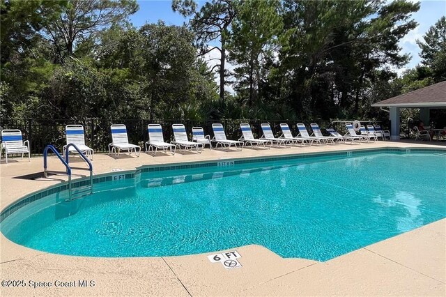 115 Briarcliff Cir, Sebastian, FL 32958 - pool with a patio area and fence