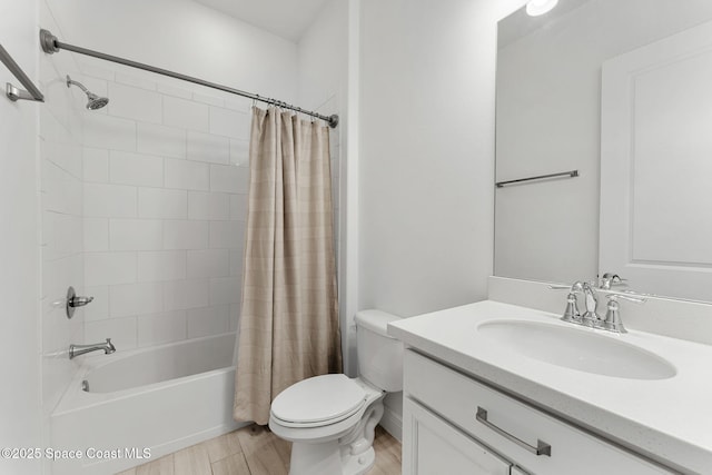8048 Gullen Dr, Melbourne, FL 32940 - bathroom with vanity, toilet, wood finished floors, and shower / tub combo with curtain