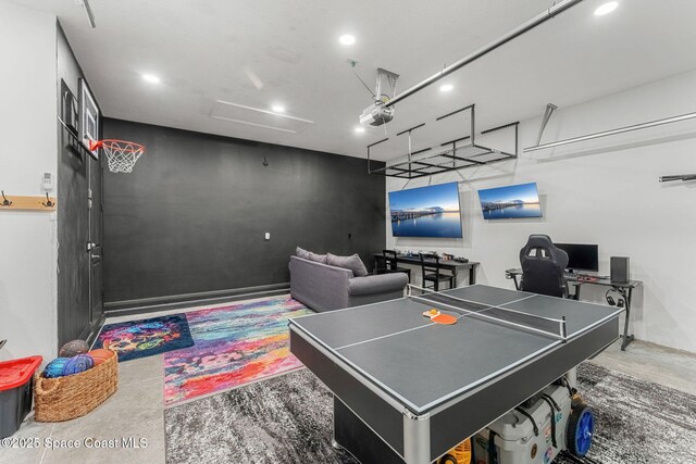 8048 Gullen Dr, Melbourne, FL 32940 - recreation room with attic access, recessed lighting, and a garage