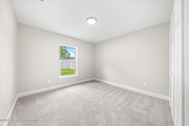1204 Captiva Island Cir SW, Palm Bay, FL 32908 - carpeted spare room with baseboards