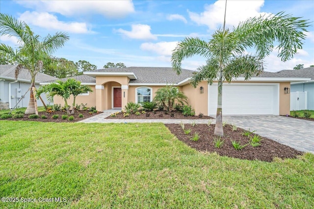 1204 Captiva Island Cir SW, Palm Bay, FL 32908 - single story home featuring stucco siding, an attached garage, and decorative driveway