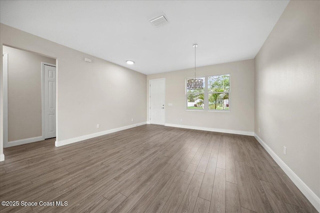 1035 Captiva Island Cir SW, Palm Bay, FL 32908 - empty room with wood finished floors and baseboards