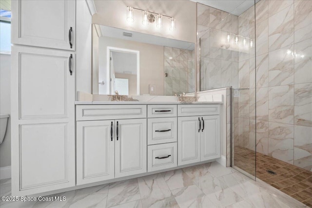 1035 Captiva Island Cir SW, Palm Bay, FL 32908 - bathroom featuring a stall shower, marble look tile flooring, and double vanity