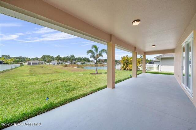 1035 Captiva Island Cir SW, Palm Bay, FL 32908 - view of patio / terrace with a water view
