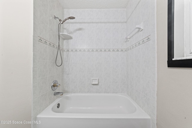bathroom with shower / washtub combination