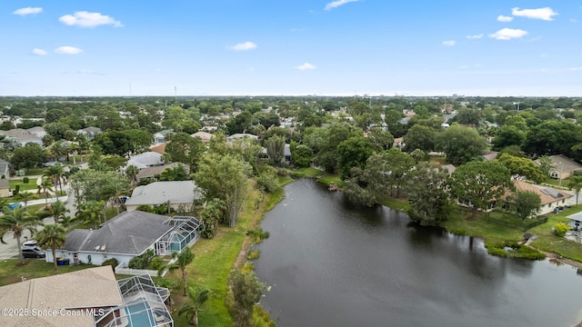 aerial perspective of suburban area with a large body of water