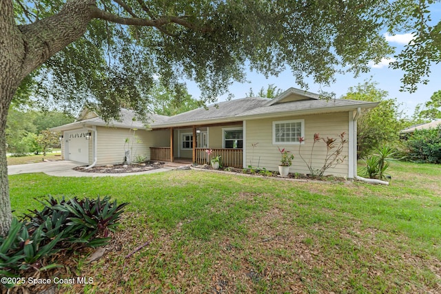 single story home featuring a garage, a front lawn, concrete driveway, and covered porch