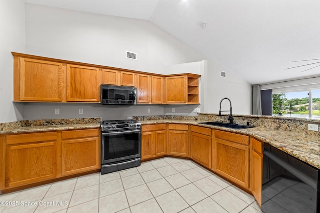 kitchen featuring black appliances, a sink, brown cabinets, open shelves, and high vaulted ceiling