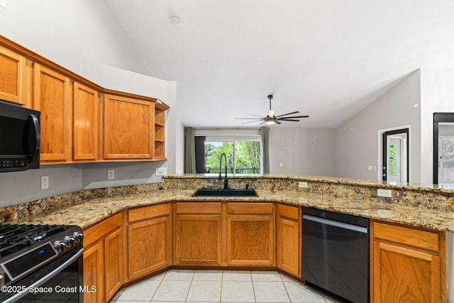 kitchen with dishwashing machine, lofted ceiling, a sink, black microwave, and brown cabinetry