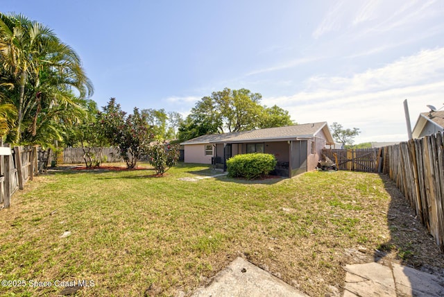 view of yard featuring a fenced backyard