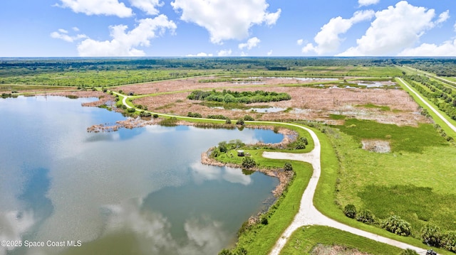 bird's eye view with a rural view and a water view
