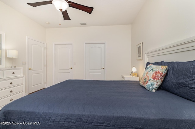 bedroom with a ceiling fan and visible vents