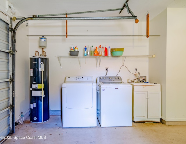 836 Brow Ct NE, Palm Bay, FL 32905 - washroom with independent washer and dryer, a sink, a garage, electric water heater, and cabinet space