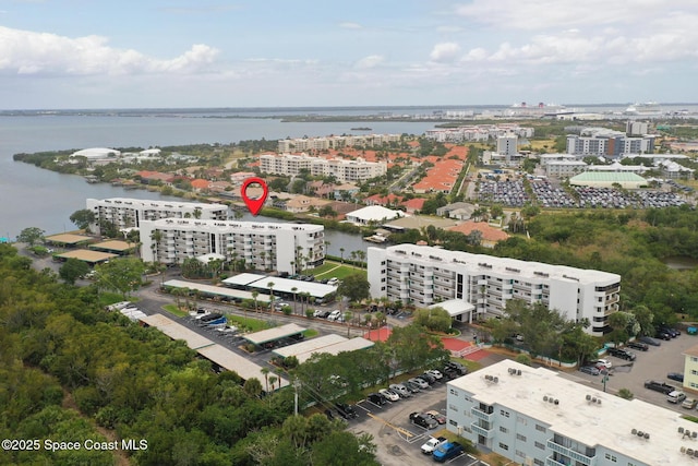 300 Columbia Dr Unit 203-2, Cape Canaveral, FL 32920 - view of urban area featuring apartment complex / building and a large body of water