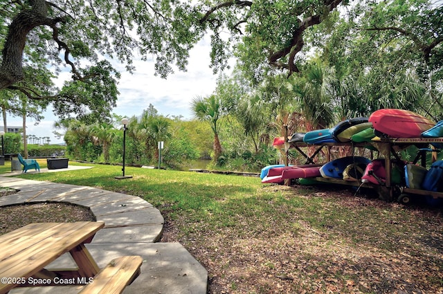 300 Columbia Dr Unit 203-2, Cape Canaveral, FL 32920 - view of grassy yard