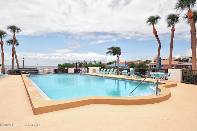 300 Columbia Dr Unit 203-2, Cape Canaveral, FL 32920 - community pool featuring fence and a patio