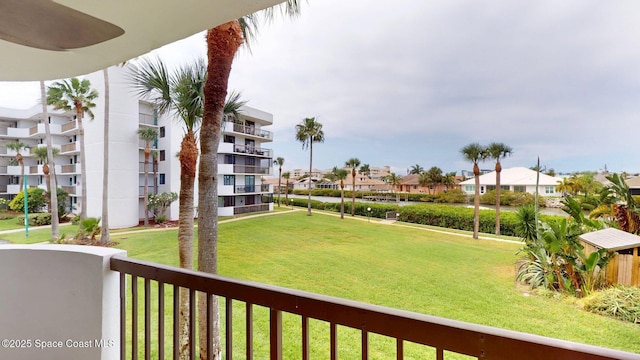 300 Columbia Dr Unit 203-2, Cape Canaveral, FL 32920 - view of grassy yard with a residential view and a balcony